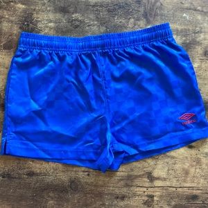 Women’s Umbro checkered shorts. Blue checkered silk shorts. Brand new.